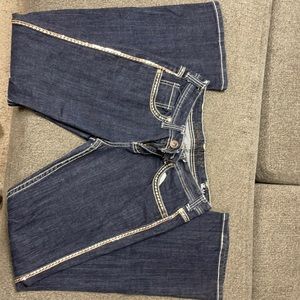 Sparkling Cowgirl Tuff Co jeans.